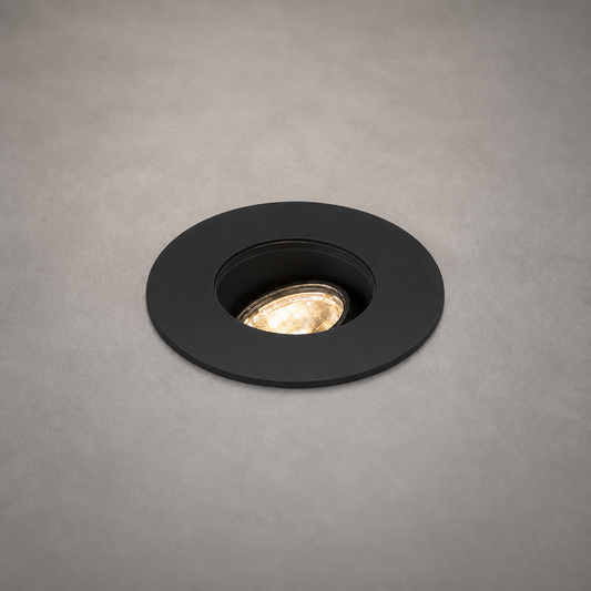 Matte black finish recessed indoor spotlight DECK PRIME 1677 flush mounted with faceted LED lens detail