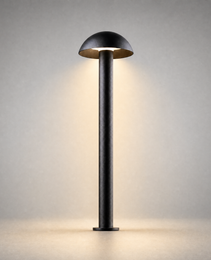 textured black matte outdoor bollard light with warm glow