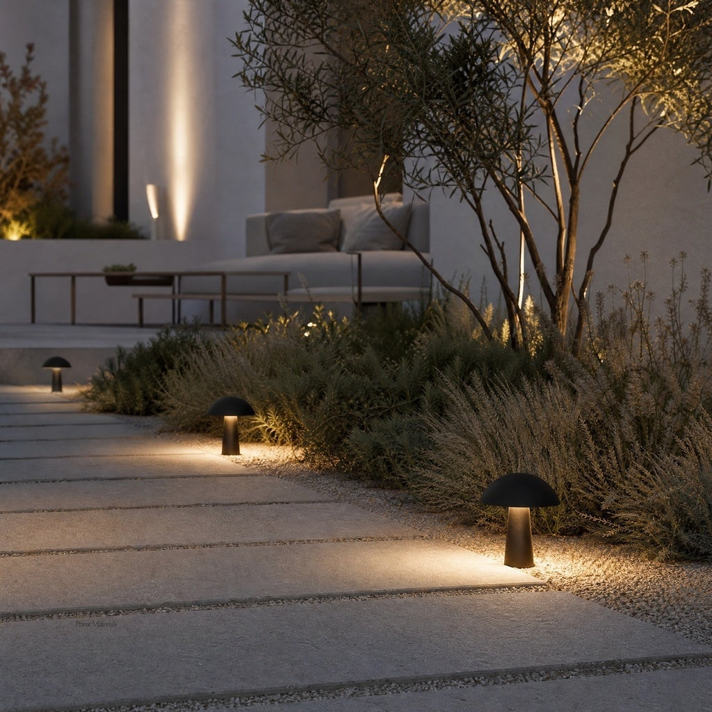 matte black mushroom path lights highlighting drought-tolerant shrubs