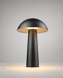 matte black mushroom outdoor ground light with warm gold interior LED