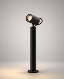 Close-up of black swivel head bollard with gold LED reflector detail