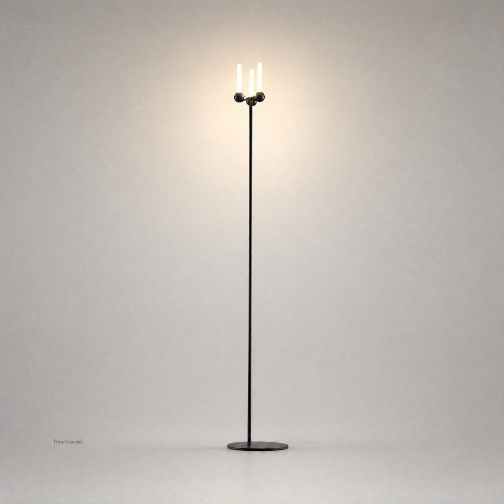 Black Mobile PRIME 0012 floor lamp with spherical joints and warm glow on gray backdrop