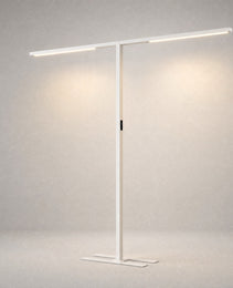 White matte-finish architectural floor lamp with H-style base studio shot