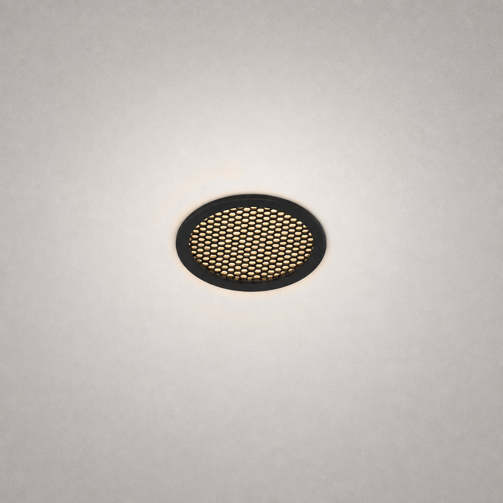 black matte honeycomb grille recessed GU10 module emitting warm diffused light