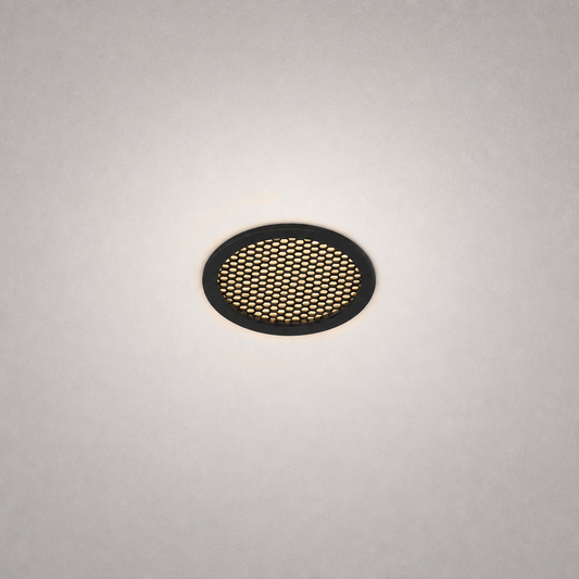 black matte honeycomb grille recessed GU10 module emitting warm diffused light