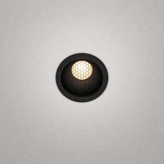Black GU10 LED module with hexagonal honeycomb grille and matte finish