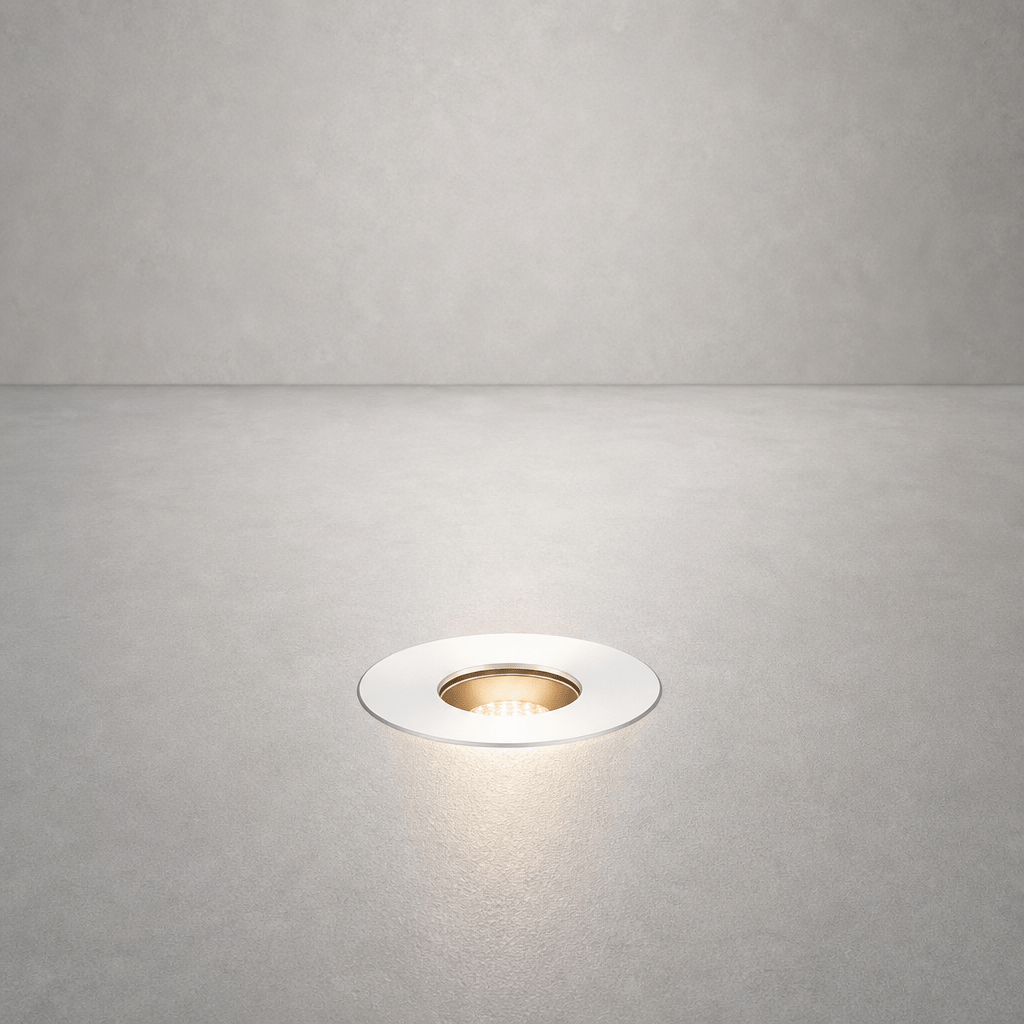 DECK PRIME 1168 flush-mount outdoor ground light in matte white with warm LED glow