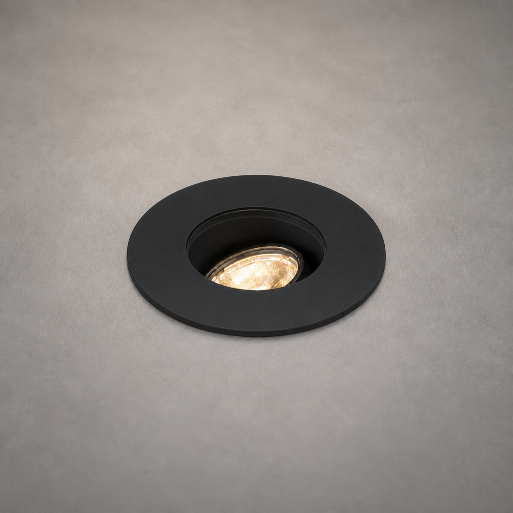 Matte black finish recessed indoor spotlight DECK PRIME 1677 flush mounted with faceted LED lens detail