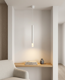 White matte cylindrical pendant light with frosted glass diffuser lighting architectural bookshelf in modern interior