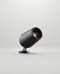 Black industrial finish outdoor spike light with durable grain texture