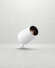White cylindrical outdoor lamp with brushed gold interior reflector