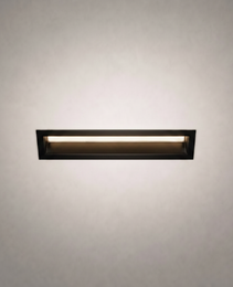 Black frame flush-mount rectangular LED ceiling light emitting warm glow