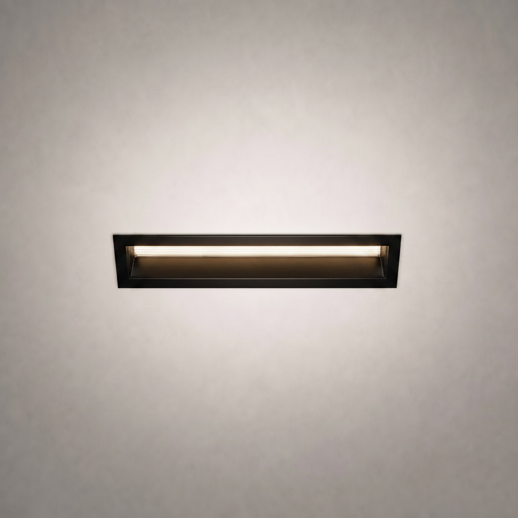 Black frame flush-mount rectangular LED ceiling light emitting warm glow