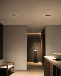 Rectangular recessed LED ceiling light with white frame in modern beige interior