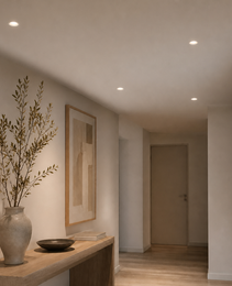 White trim recessed ceiling lights installed in hallway for clean architectural look