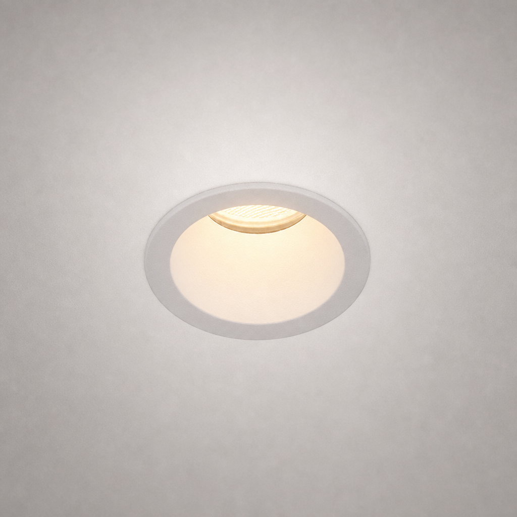 Matte white or gray recessed ceiling fixture IP65 with beveled rim and soft glow