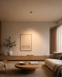 Black recessed ceiling spotlight in modern living room illuminating artwork
