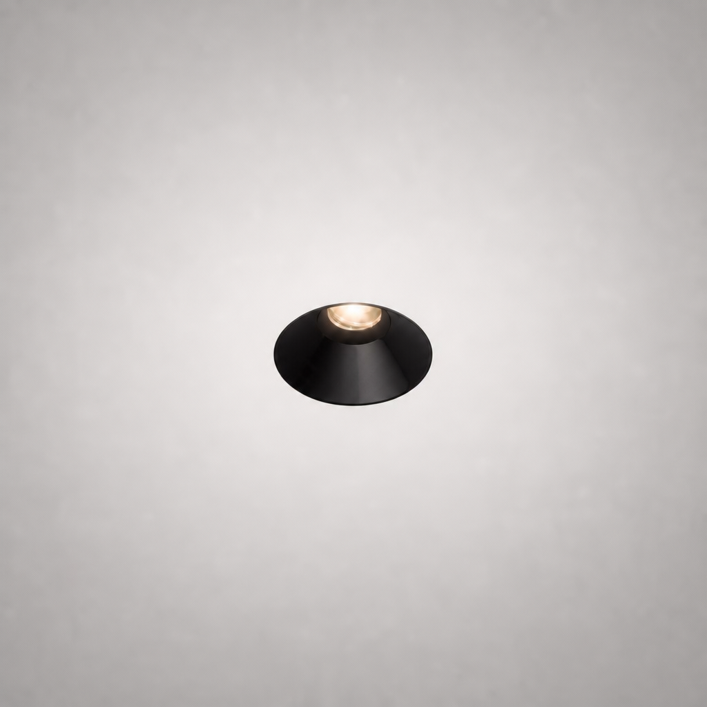 Close-up matte black conical recessed spotlight MAXI PRIME 1766 with circular trim and warm LED
