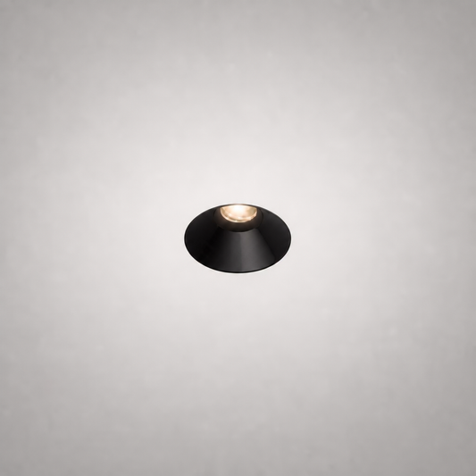 Close-up matte black conical recessed spotlight MAXI PRIME 1766 with circular trim and warm LED