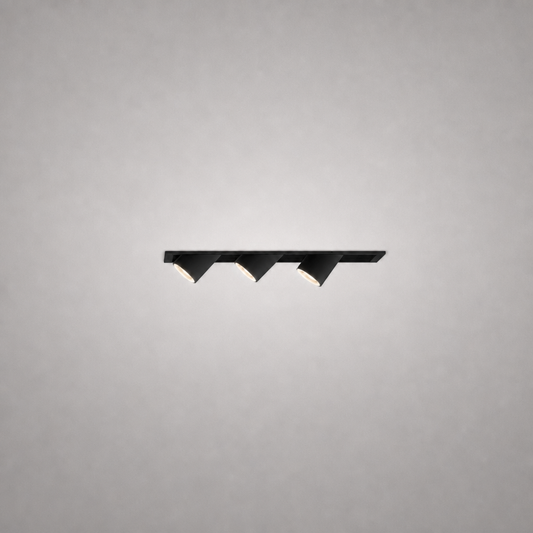 Matte black recessed LED track light with three directional conical spot heads