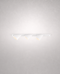 Close-up white rectangular recessed spotlight fixture with three adjustable heads