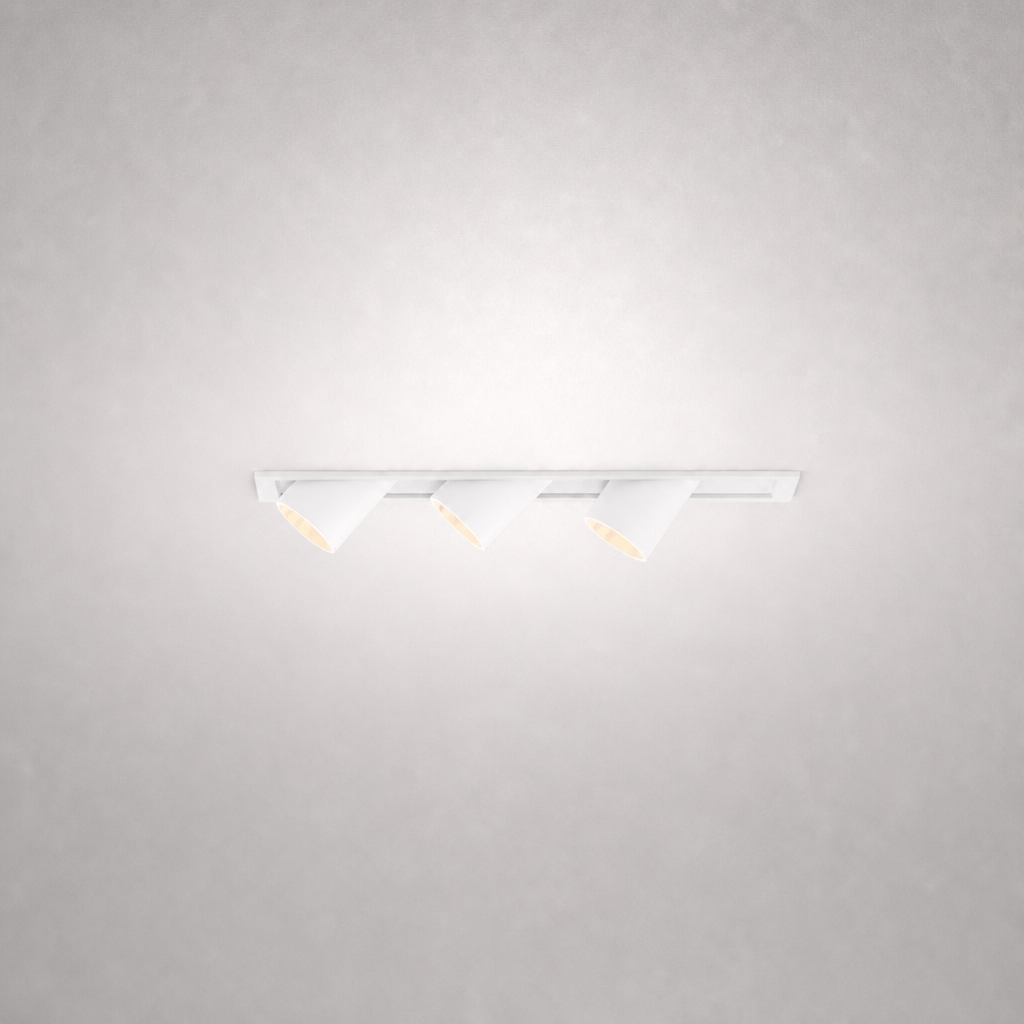 Close-up white rectangular recessed spotlight fixture with three adjustable heads