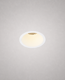 Close-up of MOON PRIME 1820 fixed recessed spotlight with white trim and heat-dissipating fins on matte gray ceiling