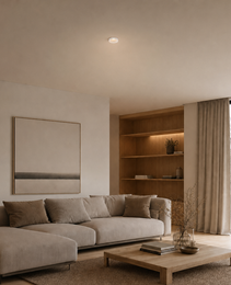 White semi-recessed ceiling spot light ROYCE PRIME 1828 integrated into neutral living room with warm ambient lighting