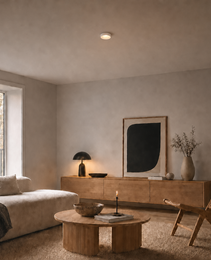 White recessed ceiling fixture blending into neutral Scandinavian living room decor