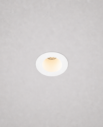 white finish DOT PRIME 1839 recessed ceiling light installed in light gray textured ceiling