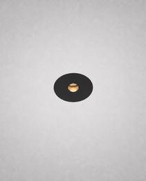 Black Vero Prime 1847 no-border recessed spotlight with gold reflector on textured ceiling