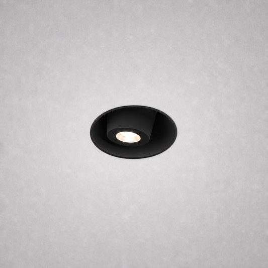 Black frameless recessed ceiling spotlight VERO PRIME 1850 with anti-glare shield in textured gray ceiling