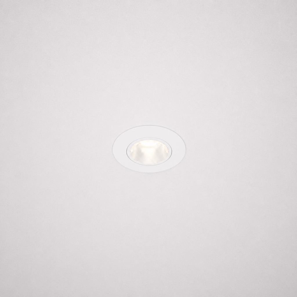 White borderless recessed LED ceiling light emitting bright white glow in minimalist interior