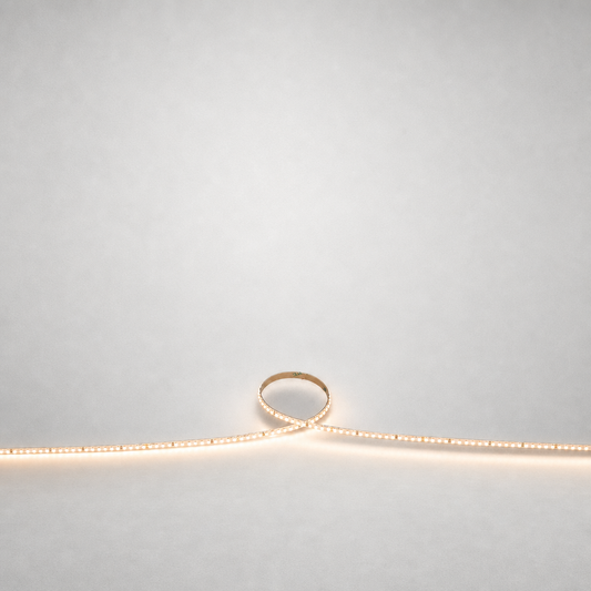 Ultra-thin warm white LED strip light 9.6W CRI80 with flexible PCB and adhesive backing