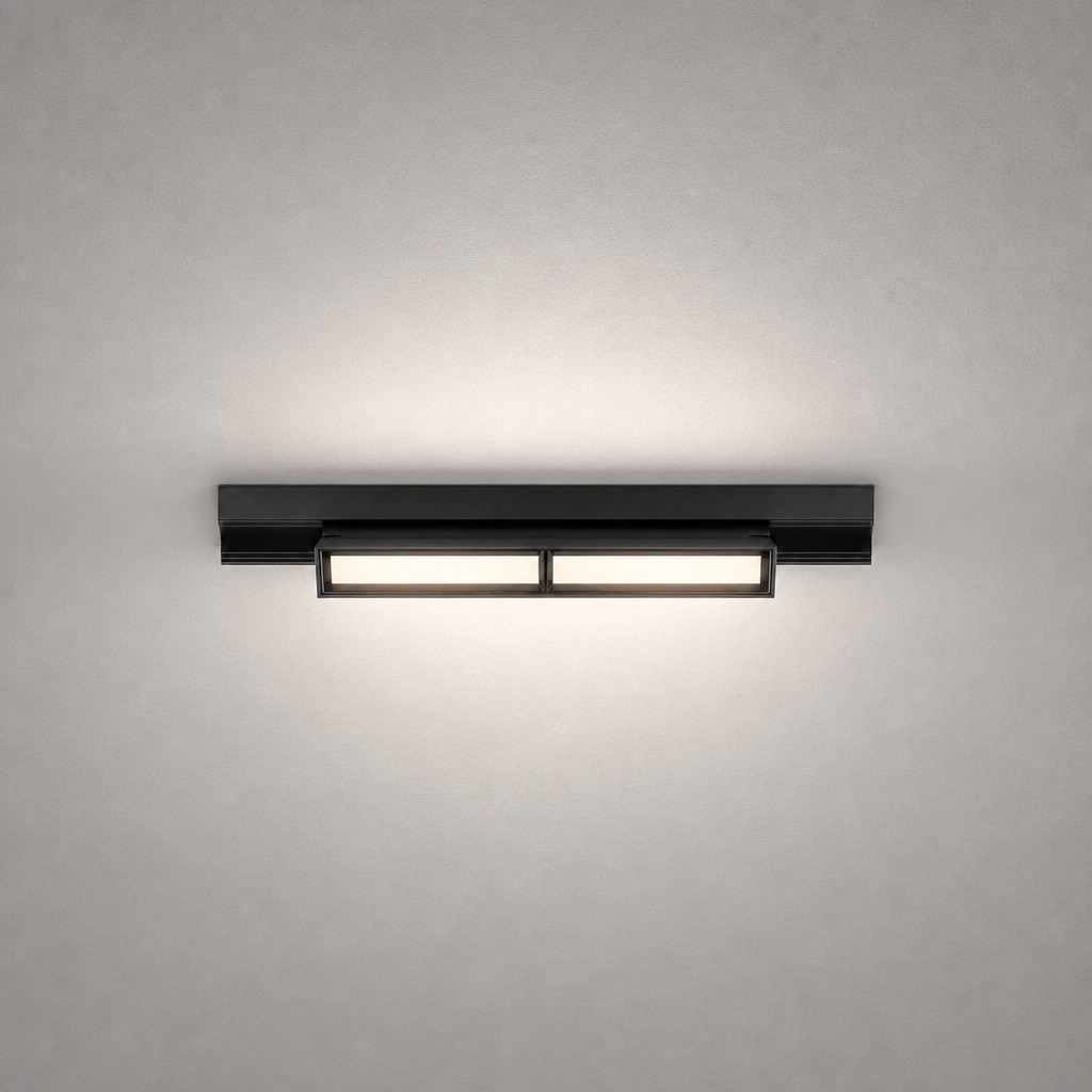 Black modern rail lighting fixture with matte finish and dual warm white modules on gray wall