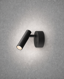 Close-up black oval wall mounted spotlight with directional arm
