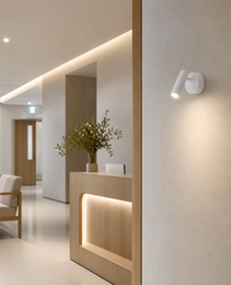 OVAL PRIME 0020 white wall light in modern minimalist lobby setting