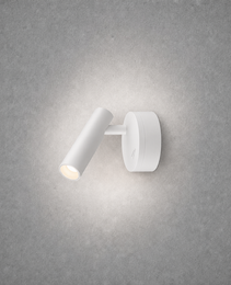 White matte oval wall sconce spotlight with adjustable joint on concrete