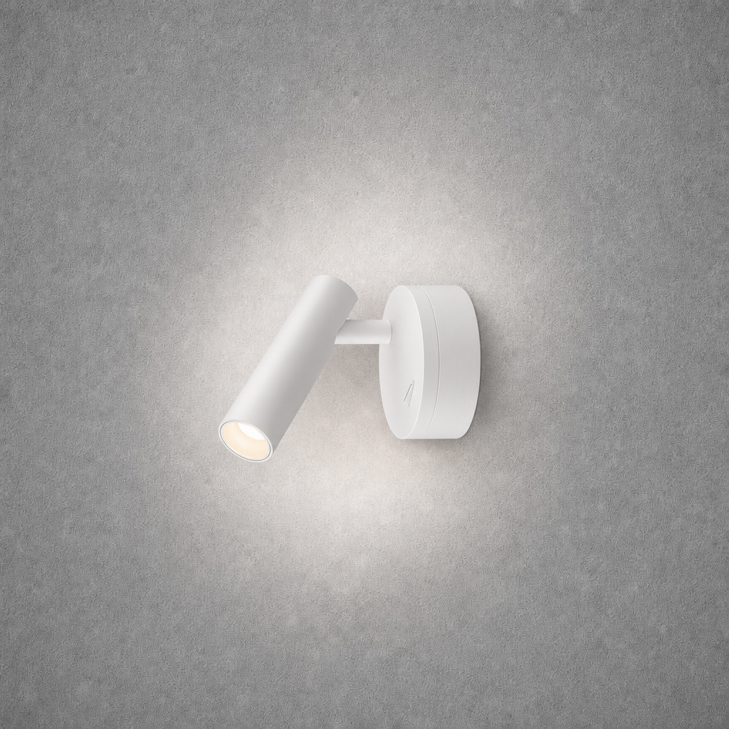 White matte oval wall sconce spotlight with adjustable joint on concrete