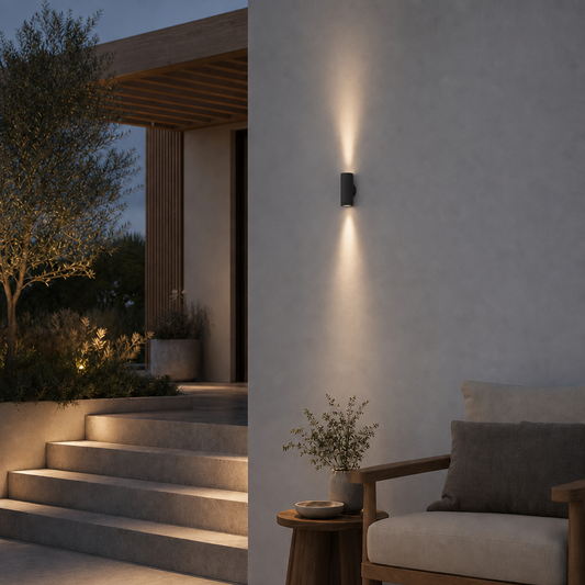 Dark gray matte outdoor wall sconce OVAL PRIME 0074 with symmetrical light beams on textured concrete