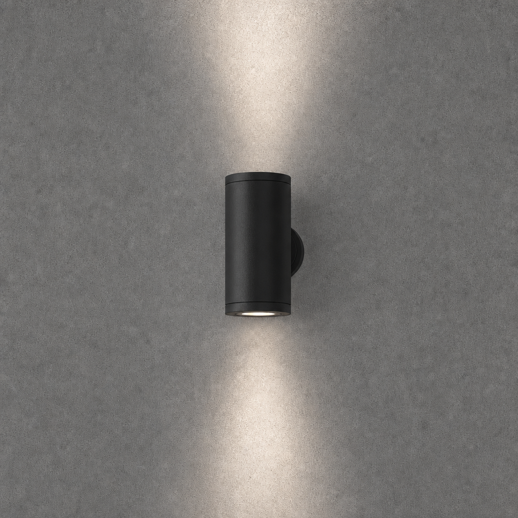 Black matte finish exterior wall sconce OVAL PRIME 0074 featuring ridged mounting plate and dual beam light