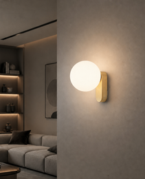 Brushed gold oval wall light fixture for contemporary residential interiors