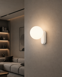 Matte white oval wall sconce with frosted diffuser for modern living room