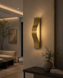 Helix wall sconce with brushed gold frame and natural alabaster panel on textured beige wall