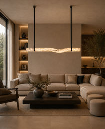 Linear wavy albino marble pendant light with black suspension rods over living room sofa