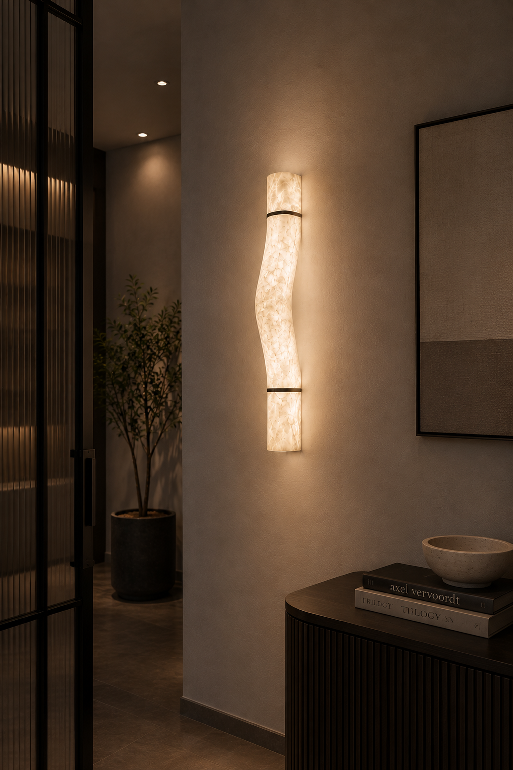 Organic shape alabaster wall light fixture LIBRA with black metal rings in minimalist interior setting