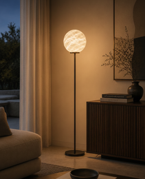 Marsa Floor alabaster floor lamp with spherical veined shade and matte black metal base in contemporary living room